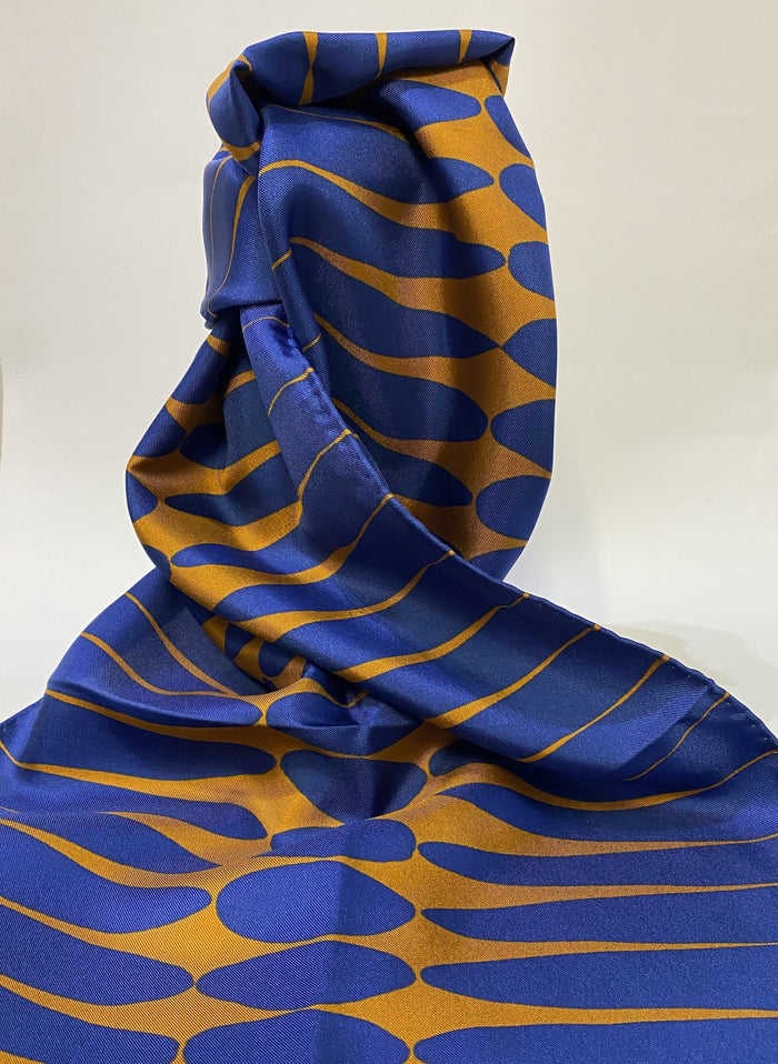 Long ,luxurious 100% silk printed scarf by Faye Stevens.