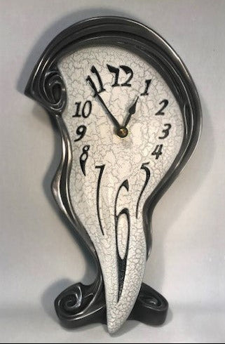 Decorative wall clock with unique design on a white background