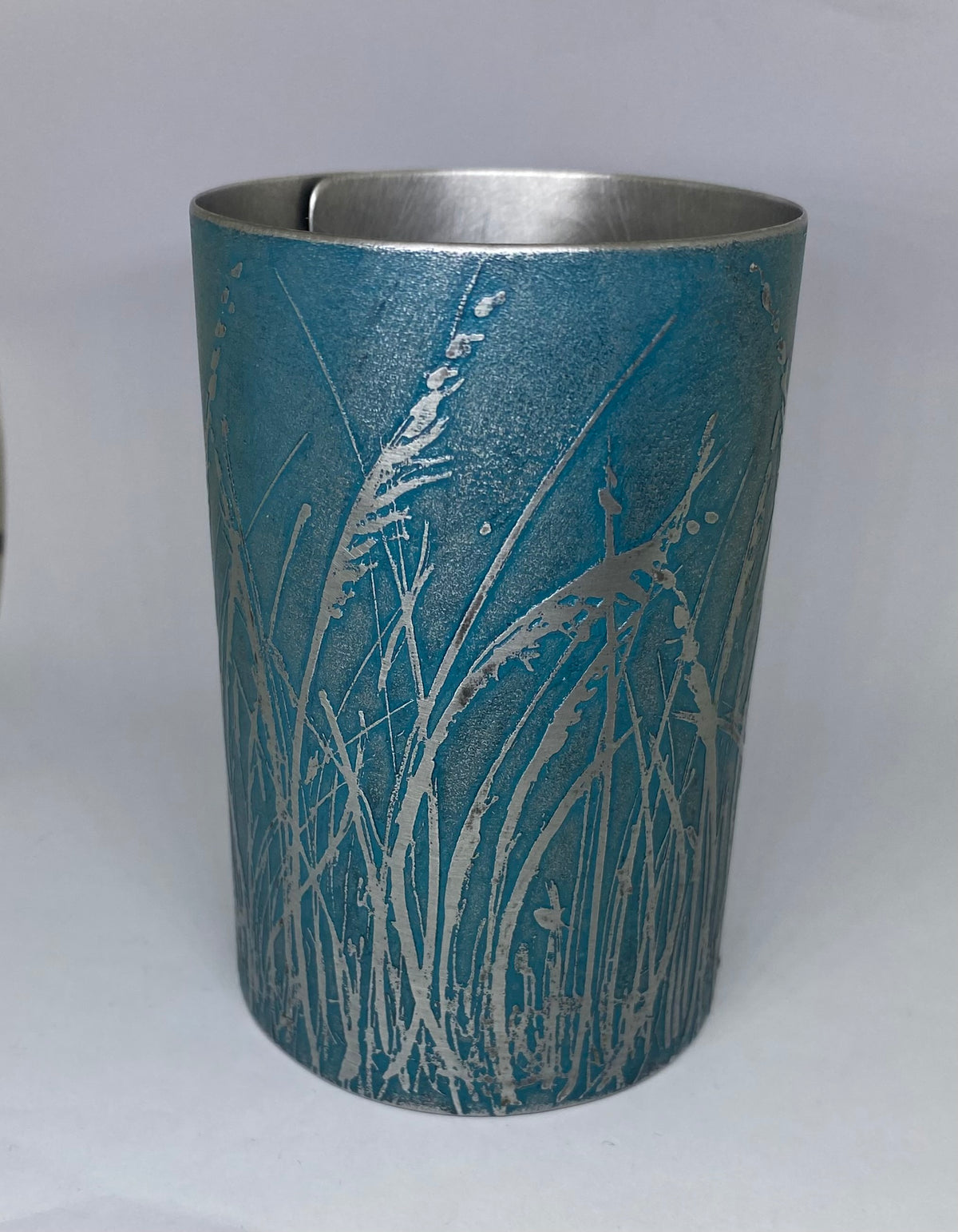 Beautiful teal aluminium vessel - hand etched by Anna Roebuck from her original wild grasses illustration.