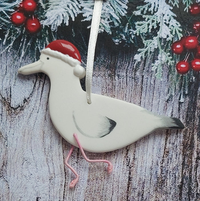 Ceramic Seagull in a Santa Hat Christmas Decoration by Angel Ceramics