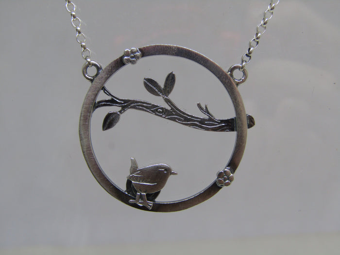 Wren, twig, blossom scene necklace by Katie Stone