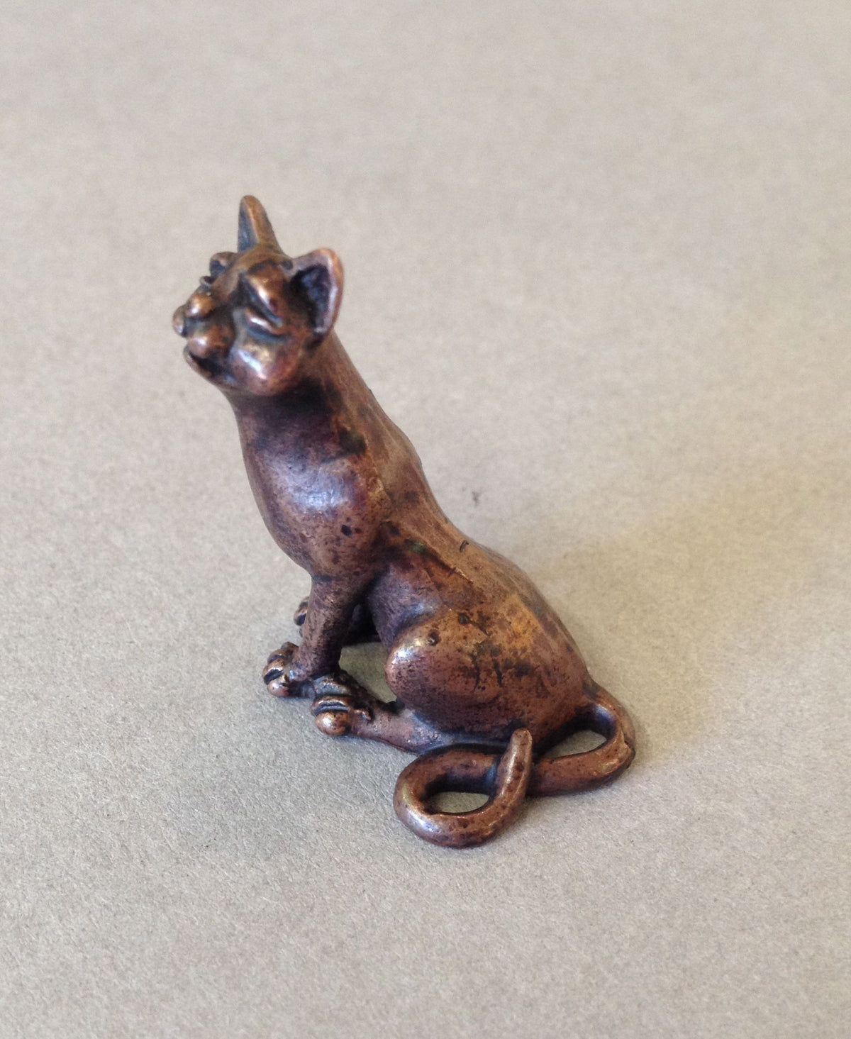Miniature Sitting Cat by David Meredith