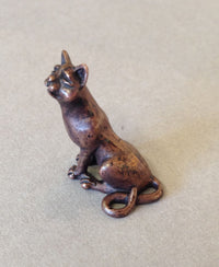 Miniature Sitting Cat by David Meredith