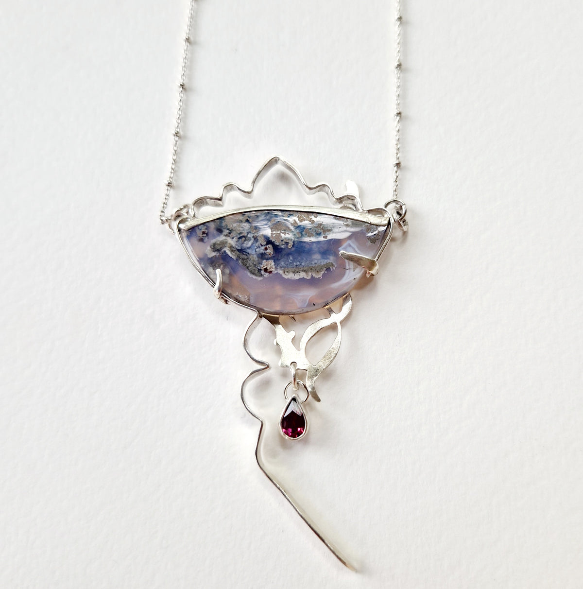 ‘Through an evaporating Window’ Necklace, sterling silver, moss agate, garnet