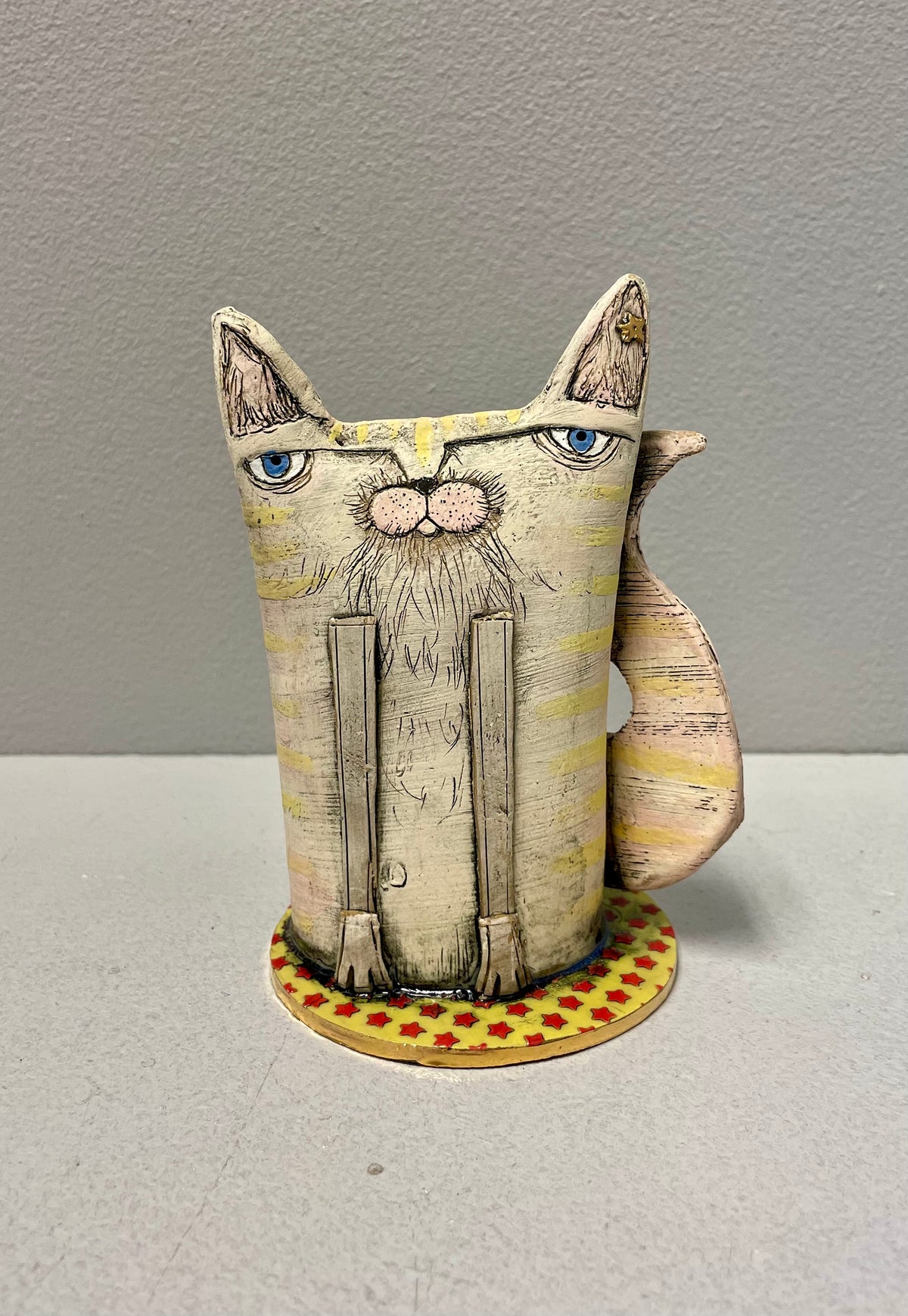 Short Yellow Cat - Ceramic Sculpture by Sarah Saunders