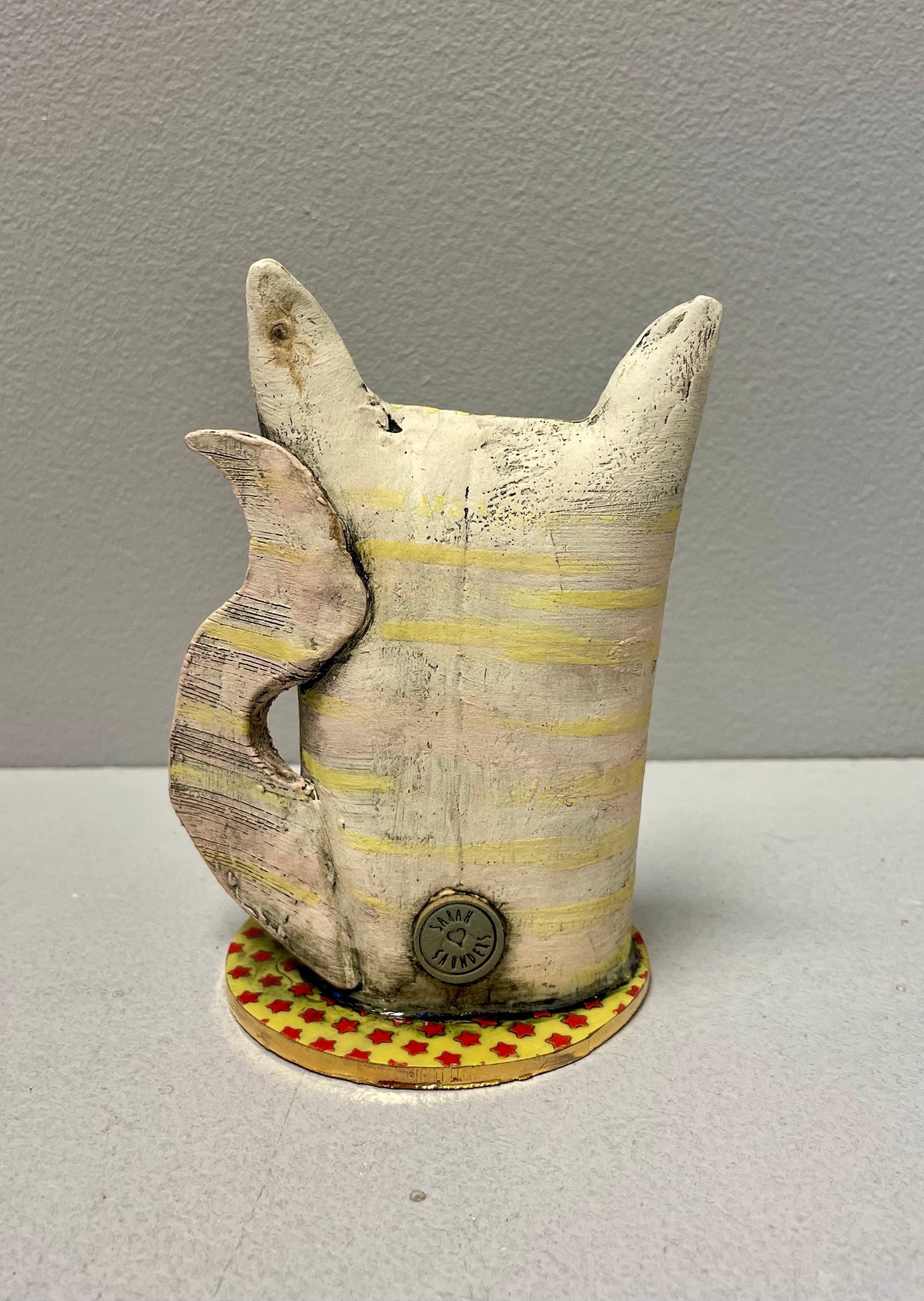 Short Yellow Cat - Ceramic Sculpture by Sarah Saunders