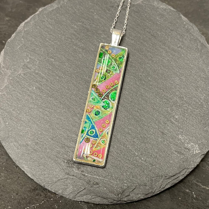 Pink and green rectangular pendant by NimaNoma