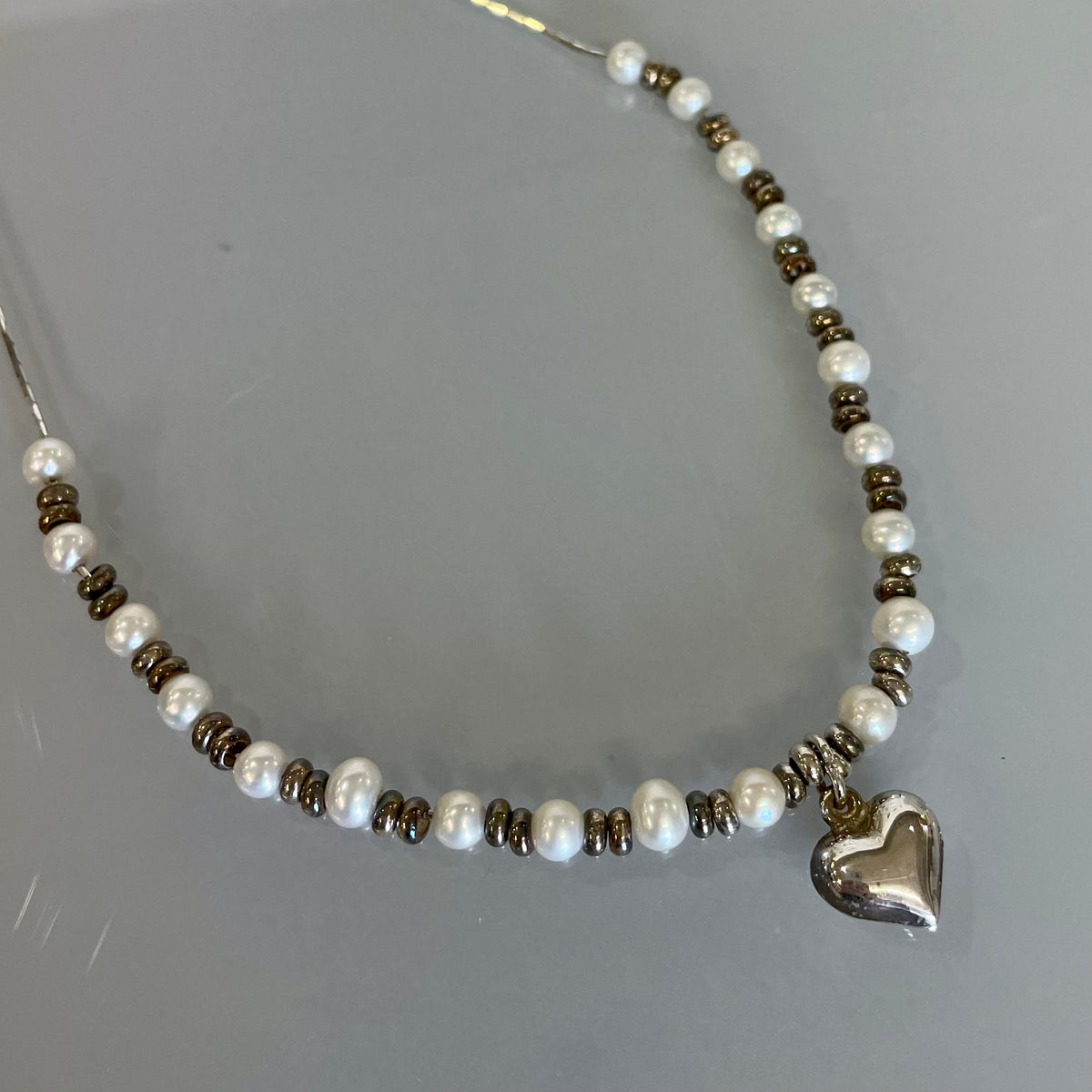 Heart and pearls necklace by Lavan