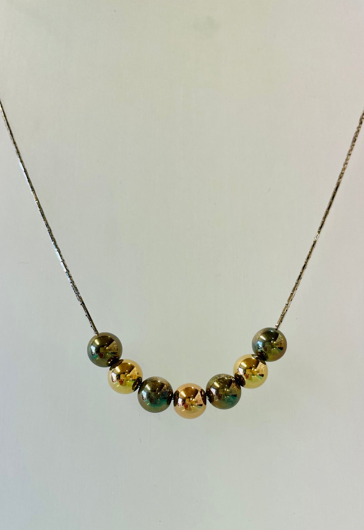 Gold and black beaded necklace by Lavan