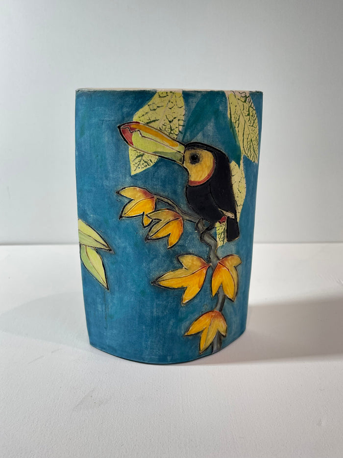 Chameleon and toucan slab vase by Jeanne Jackson