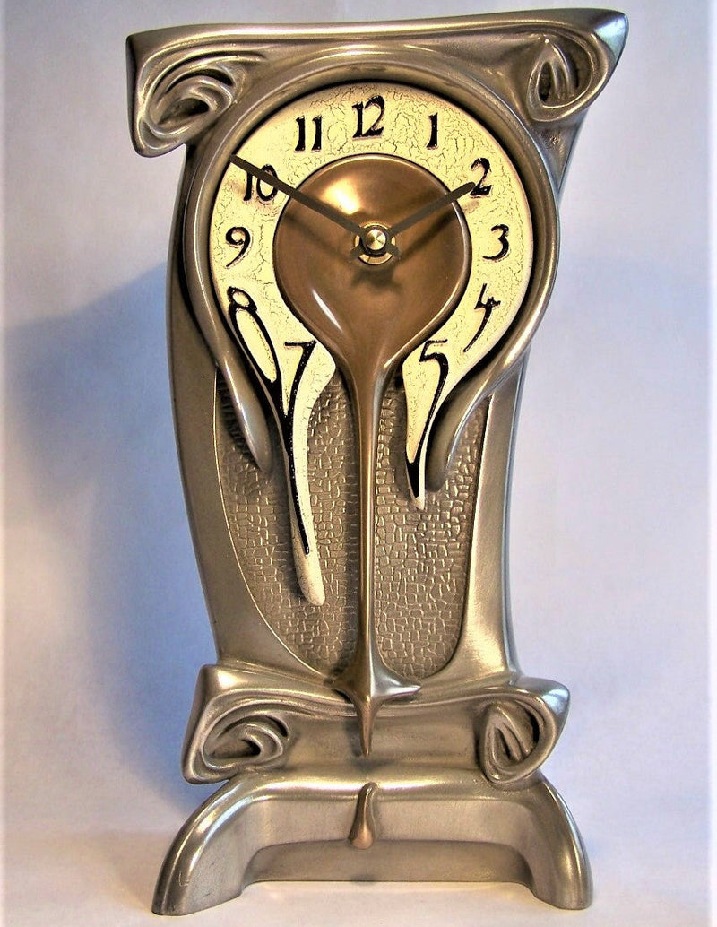 Decorative clock with Art Nouveau design on a white background