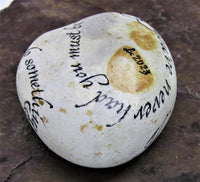 Hand painted stone by Alexis Penn-Carver