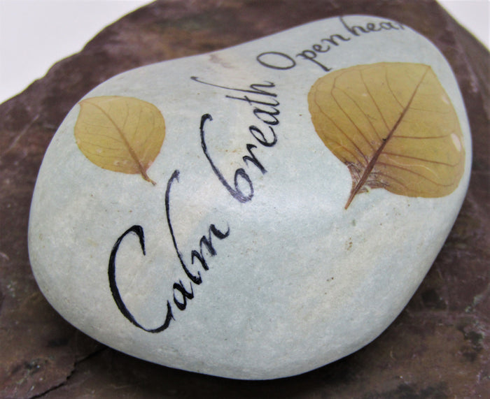Hand painted stone by Alexis Penn-Carver