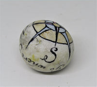 Hand painted stone by Alexis Penn-Carver