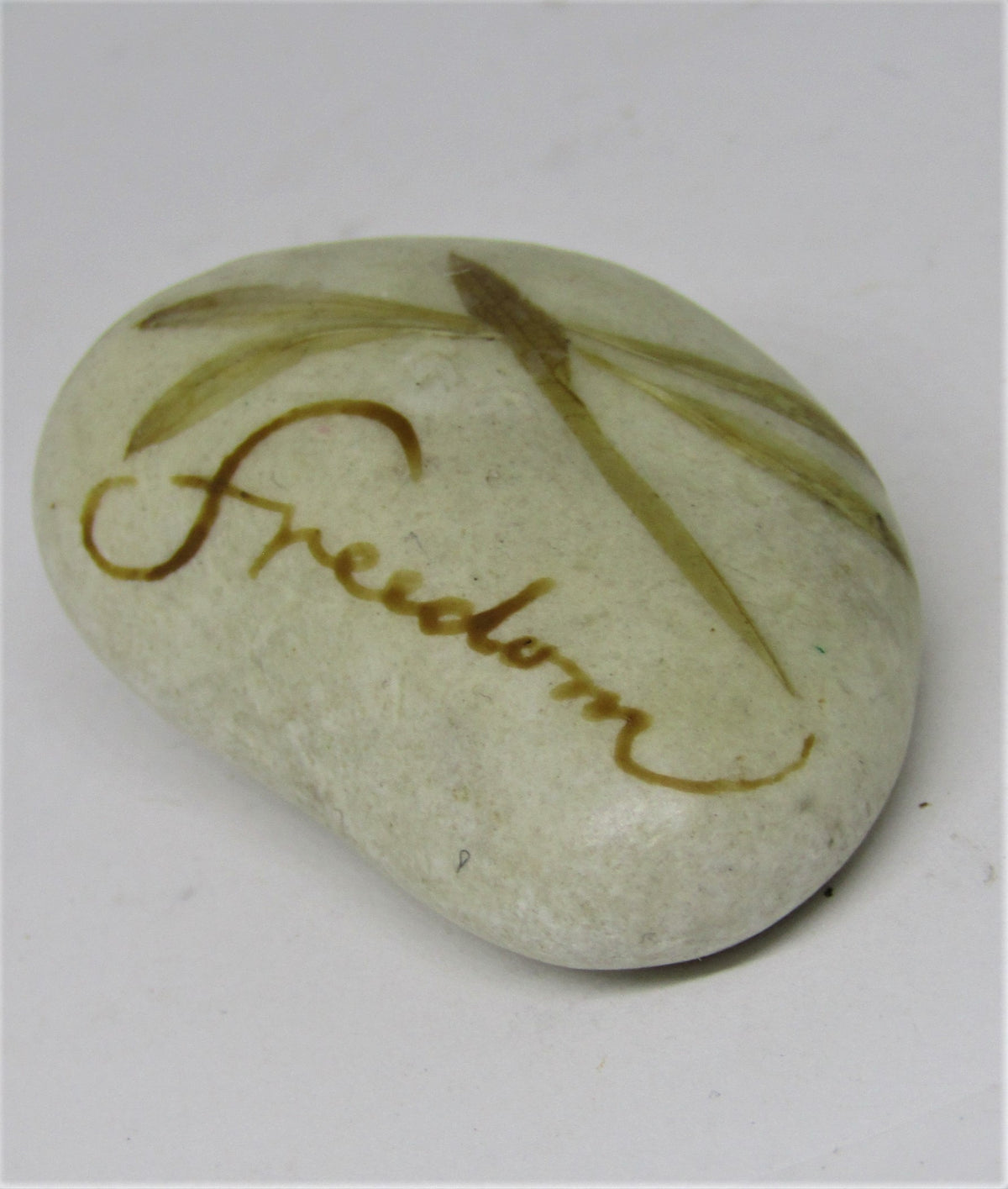 Hand painted stone by Alexis Penn-Carver