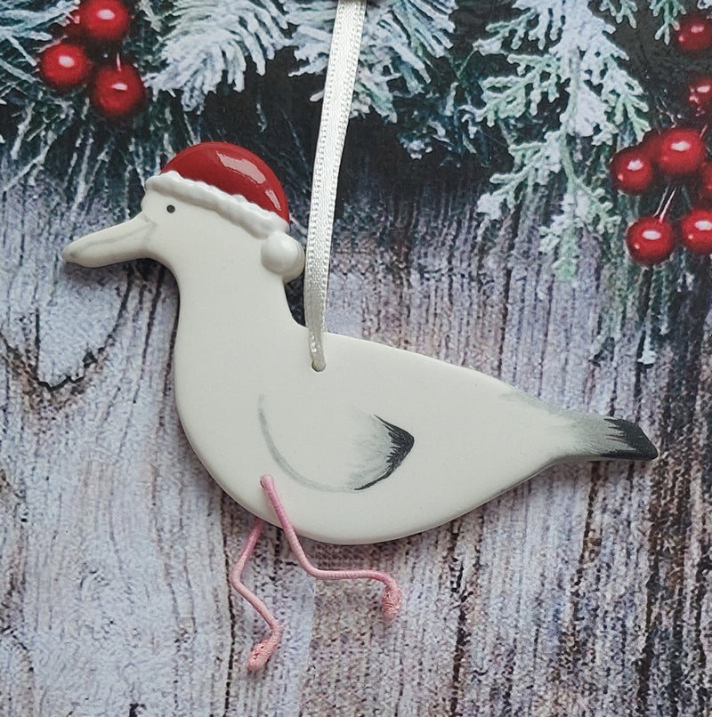 Ceramic Seagull in a Santa Hat Christmas Decoration by Angel Ceramics