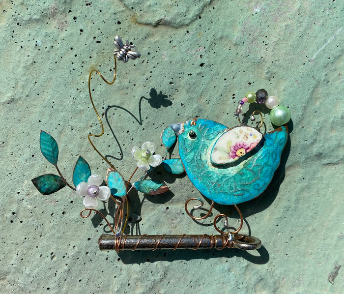 Small Bird on Key Assemblage Sculpture in Mixed Media by Linda Lovatt