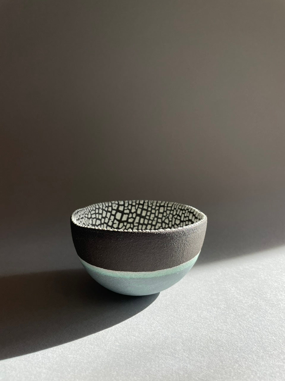 Small Turquoise and Brown Round Bowl by Emma Williams