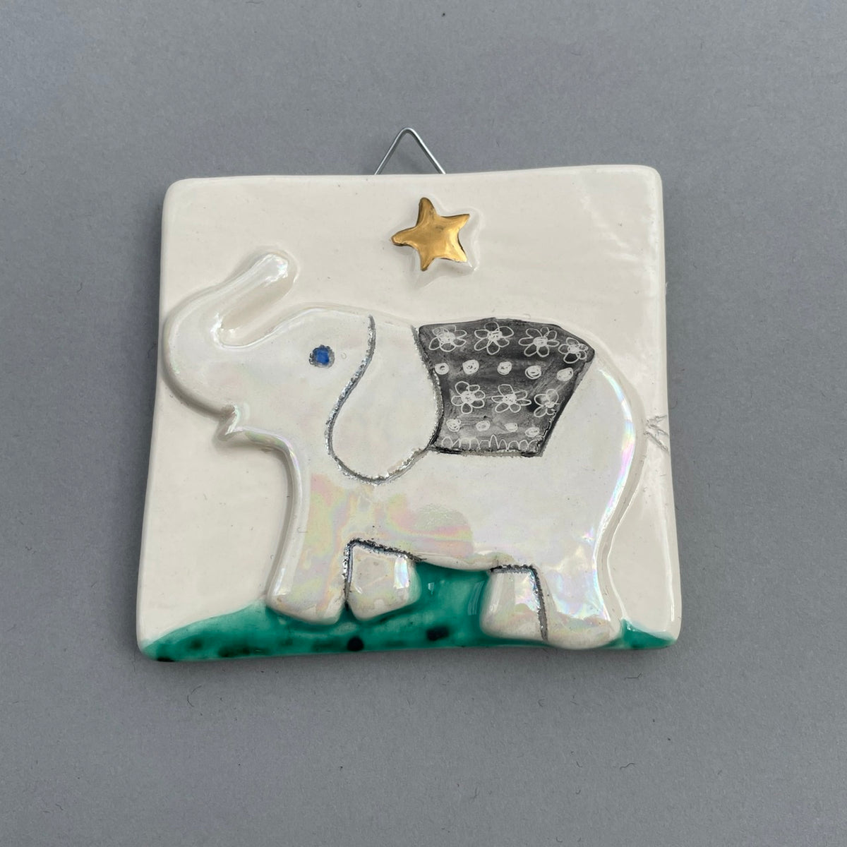 Elephant and gold star hanging tile by Sophie Smith
