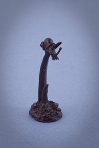 Miniature Snail on Reed