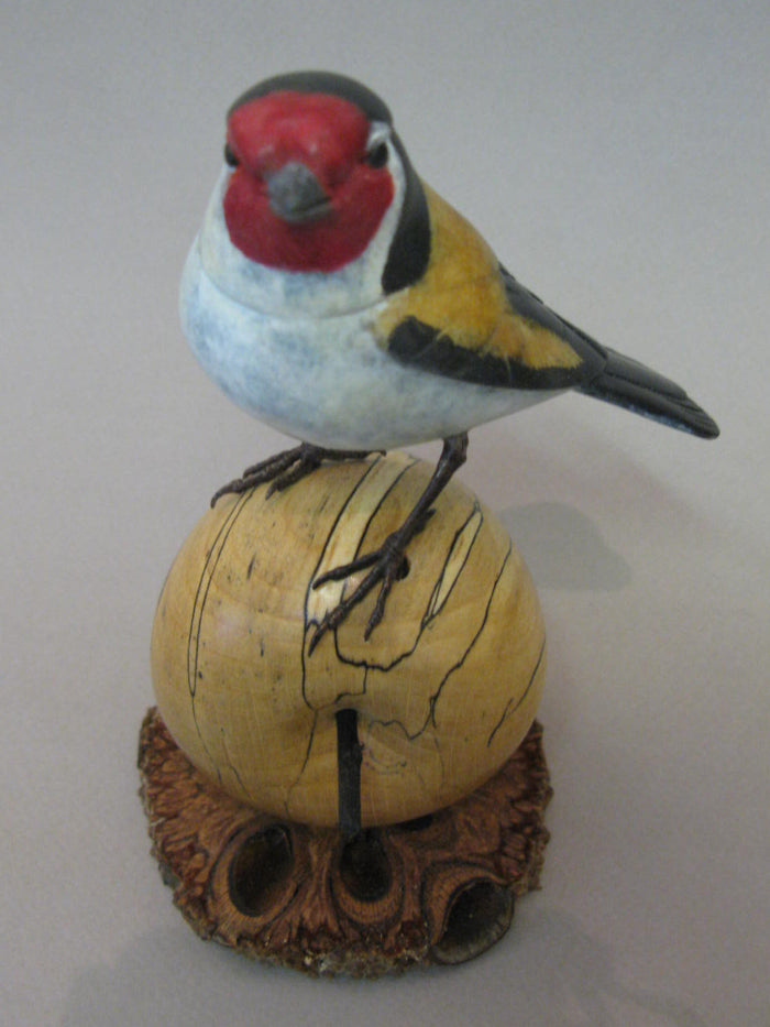 Goldfinch on Apple Bronze by David Meredith