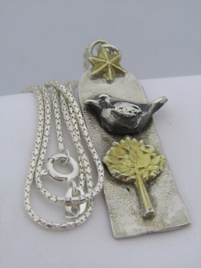 Topiary Pendant by Xuella Arnold