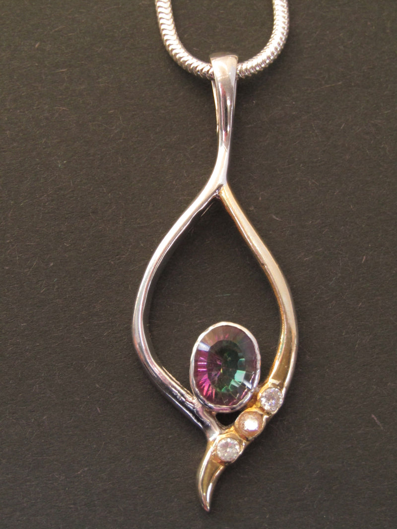 Desert Star Pendant in Silver  and Gold set with Mystic Topaz by Madeleine Blaine