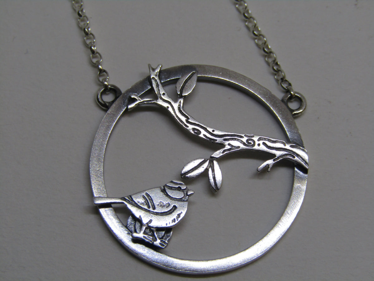 Blue tit, branch scene necklace by Katie Stone