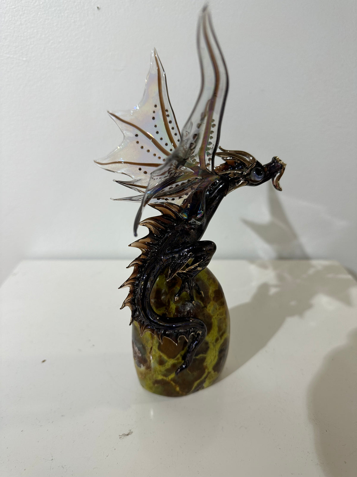 Brown/Amber Glass Dragon Sculpture on Quartz