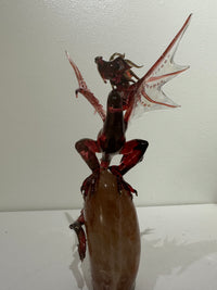 Red Glass Dragon Sculpture on Quartz