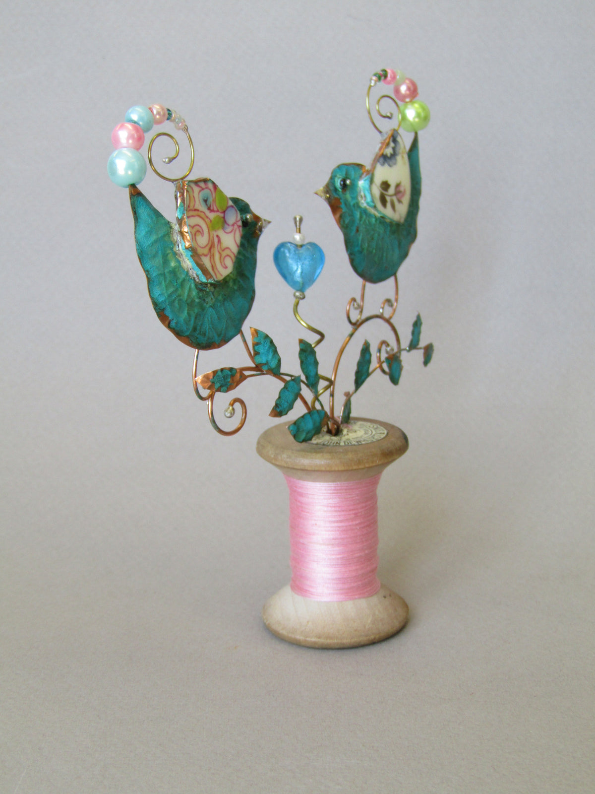 Medium Lovebirds on a Cotton Reel Assemblage by Linda Lovatt