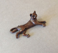 Miniature Lying Cat by David Meredith