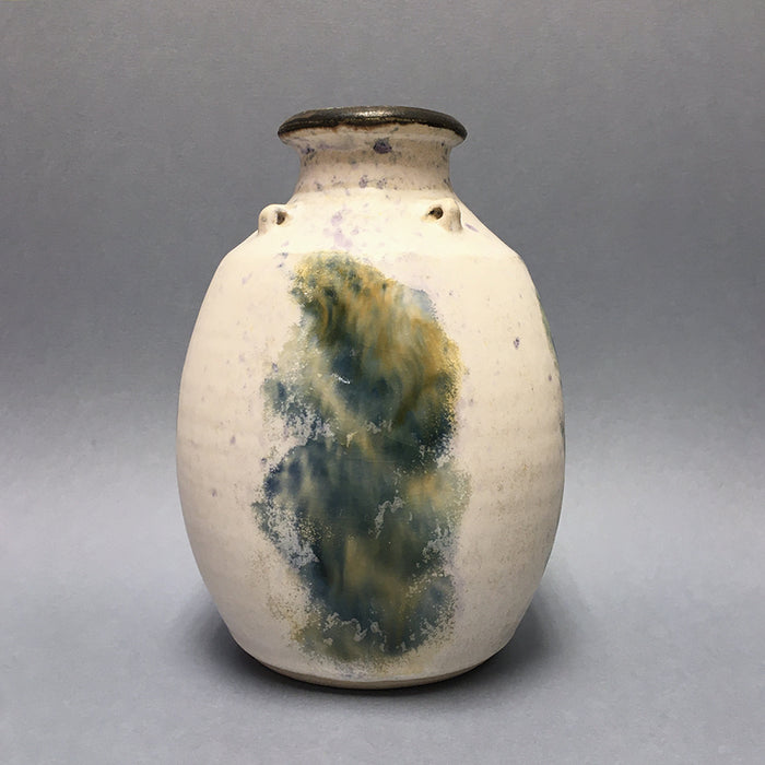 White vase with lugs by Maxwell Cowlin