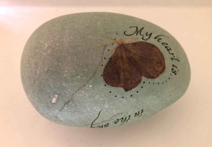 "My heart is in the sky." Handpainted stone by Alexis Penn Carver