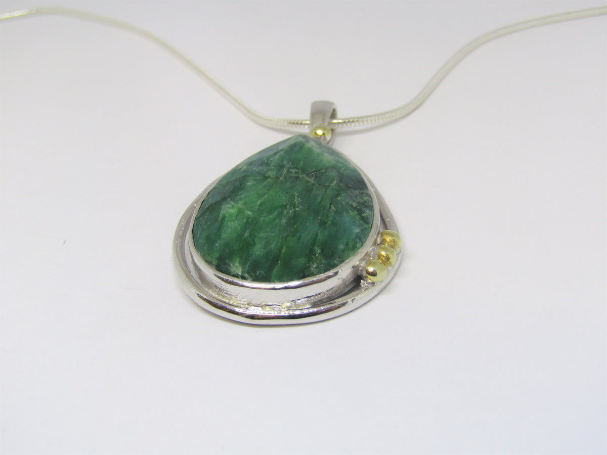 Large 'Poppy' Pendant with Emerald and gold details by Madeleine Blaine.