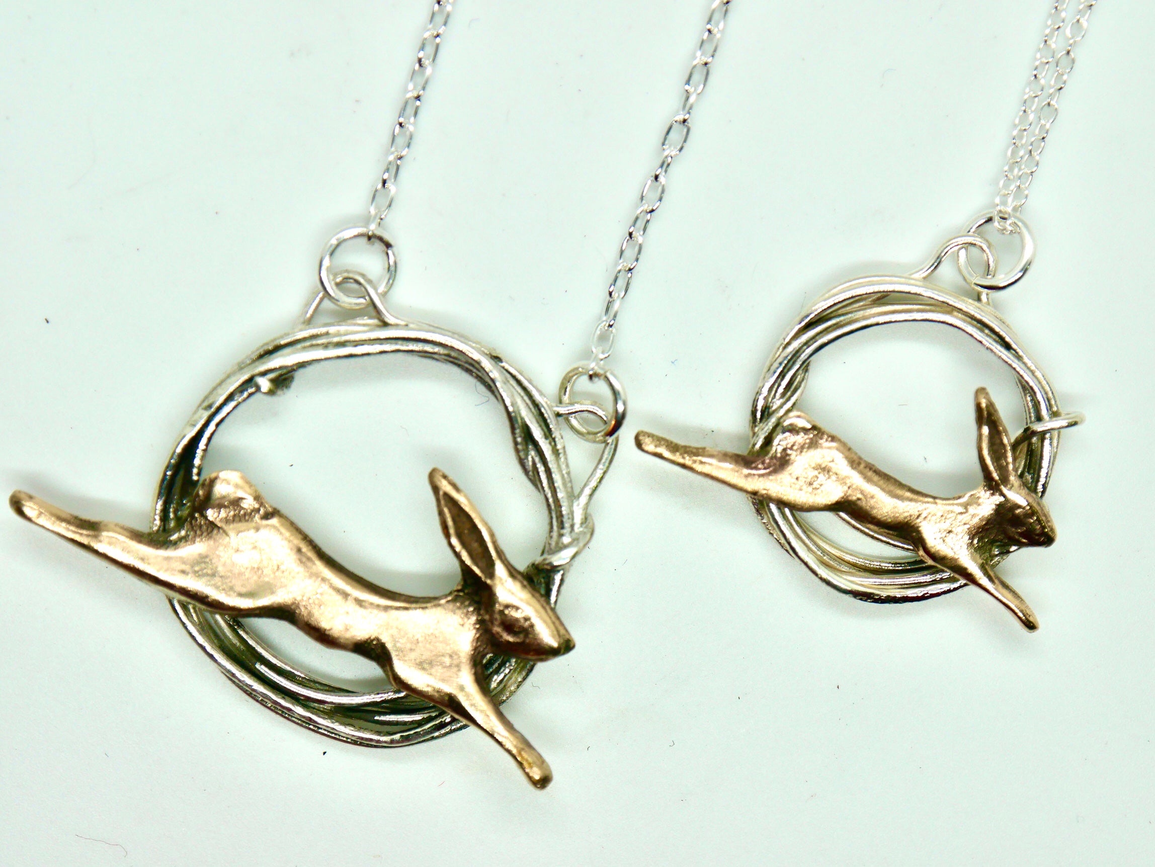 Golden Mummy Hare in Hoop Necklace by Xuella Arnold Obsidian Art