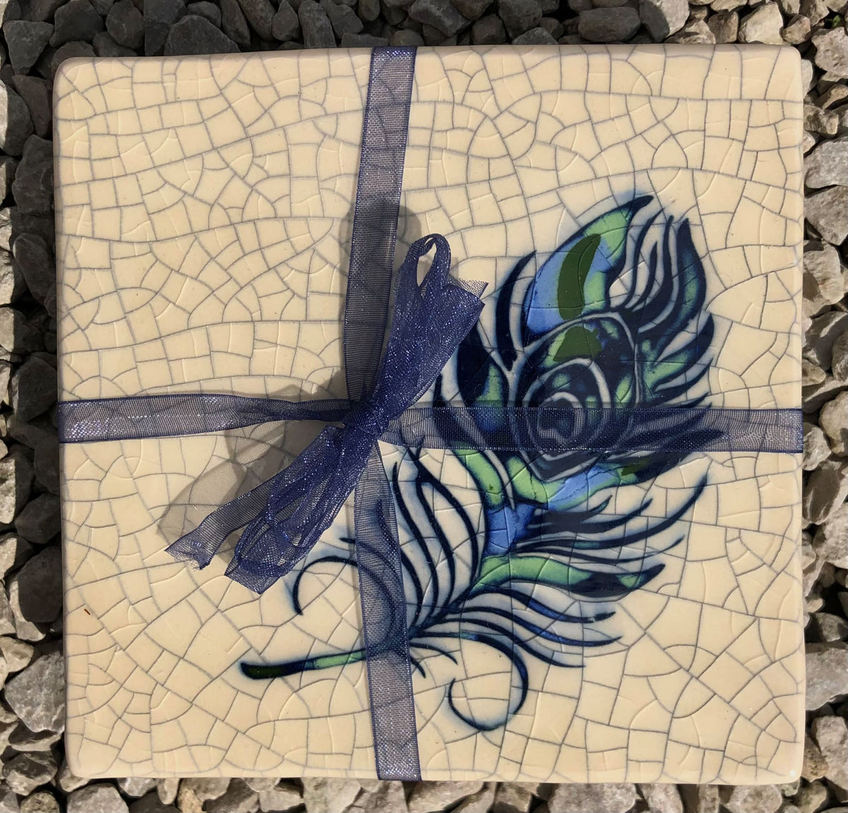 Set of two ceramic coasters with Peacock Feathers by Mel Chambers