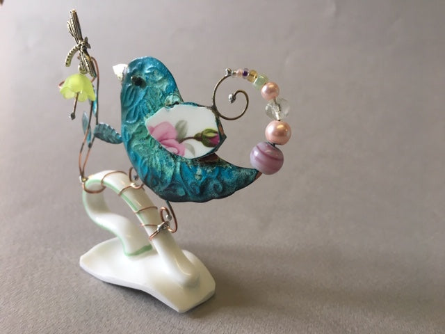 Small Birdie on Cup Handle with Green Flower by Linda Lovatt