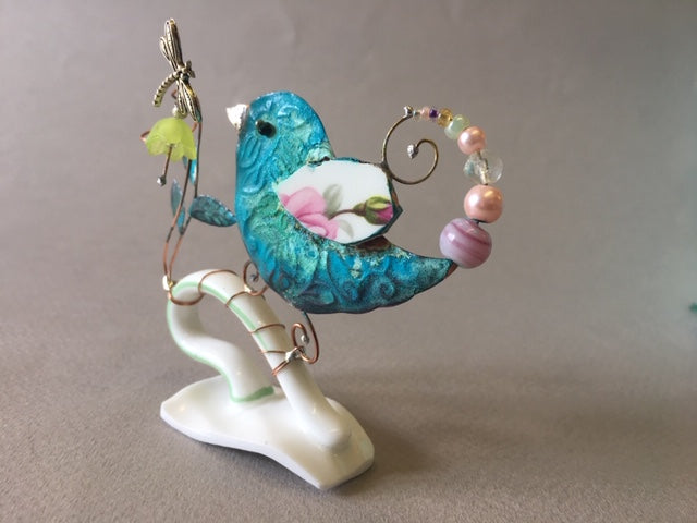 Small Birdie on Cup Handle with Green Flower by Linda Lovatt