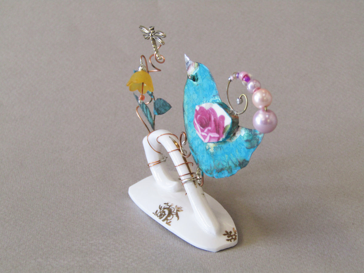 Small Birdie on Cup Handle with Yellow Flower by Linda Lovatt