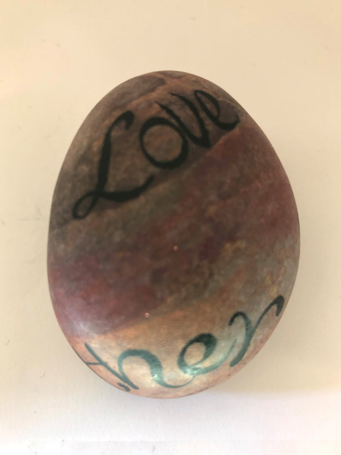 "Love is our Mother" Handpainted stone by Alexis Penn Carver